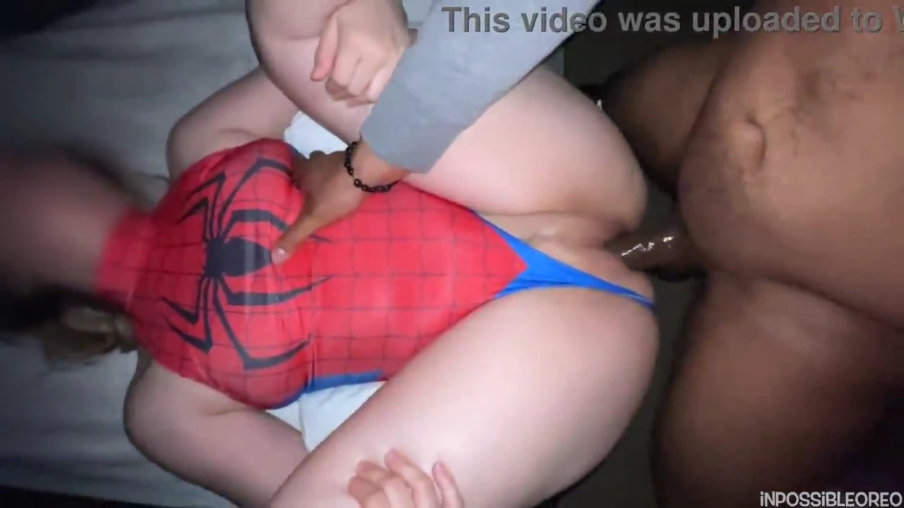 Spider-themed woman enjoys a big black shaft porn video
